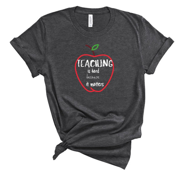 T shirt by JETT IMPRESSIONS "Teaching is Hard" Teacher T shirts for Men or Women